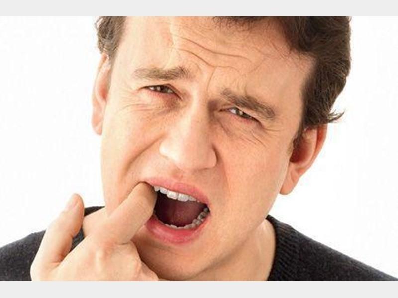 نشانه های مسائل گوارشی در دهان